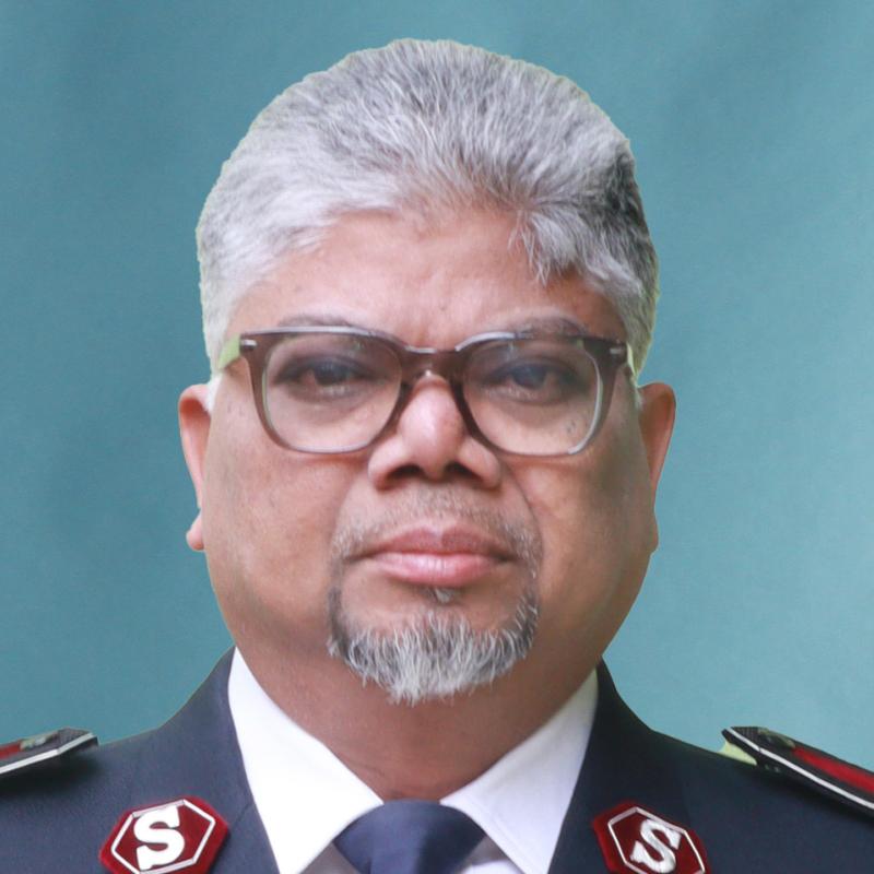 Headshot of Commissioner John William Polimetla