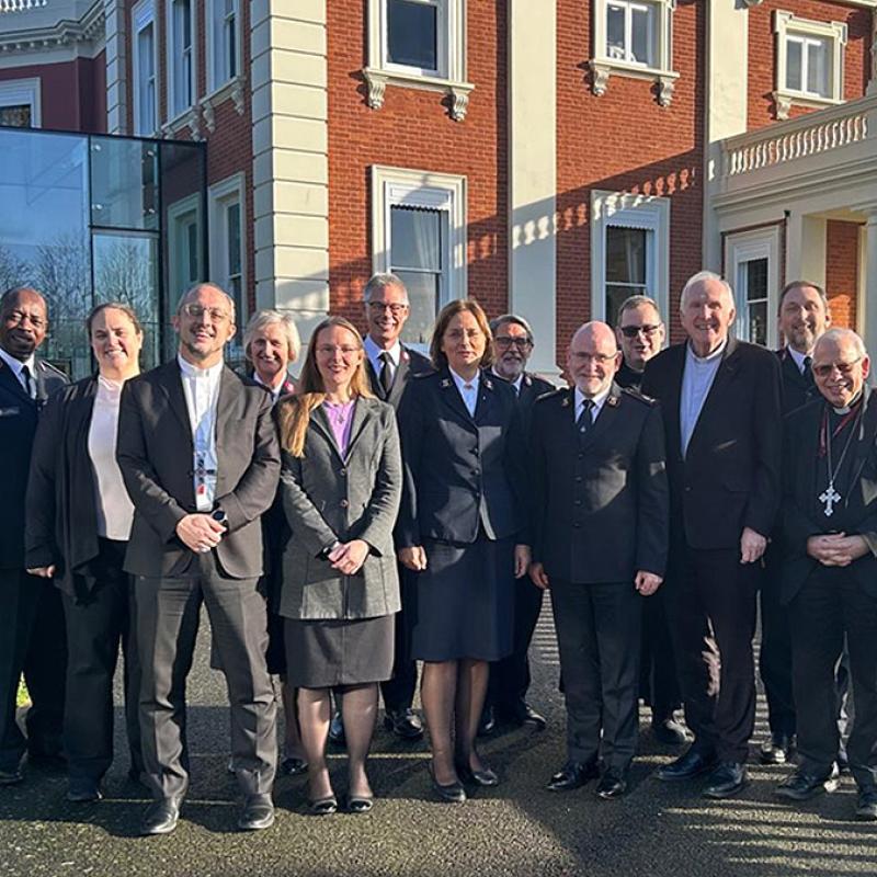 Salvationists and guests stand in front of Sunbury Court